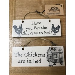 The Chickens In Bed Sign